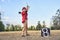 Man juggling diabolo in park