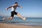 Man jumping on the beach