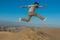 Man jumping desert peruvian coast Ica Peru