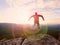 Man jumping from the mountain edge. Man jumping off a cliff without rope. Risky moment.