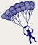 Man jumping with parachute