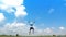 A man jumping slow motion and cloud sky background.