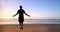 Man jumps on skipping rope in the beach