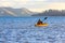 Man kayaking in Coromandel, New Zealand