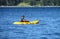 A man kayaking in a lake