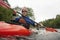 Man kayaking in river