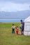 Man and kids by the yurt, Kyrgyzstan