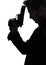 Man killer policeman holding gun portrait silhouette