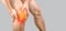 Man with knee pain on gray background. Man leg knee with red dot. Knee injury, sprain, arthritis or meniscus. Man having problems