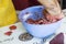 Man with knife is going to cook breakfast from different vegetables lying on the kitchen table. Healthy eating. Different kinds of