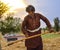 Man laborer harvesting wheat