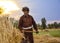 Man Laborer harvesting wheat