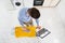 Man With Laptop While Ironing T-shirt