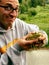 Man with large bullfrog