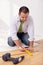 Man laying laminate flooring