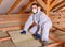 Man laying thermal insulation