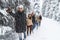 Man Lead Friends Group Snow Forest Young People Walking Outdoor