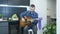 Man learning to play chords on acoustic guitar. Musician play guitar at home. Professional guitar teacher playing on acoustic guit