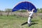 Man learns to manage homemade kitewing on the lawn