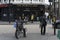 Man with leather vest on motorbike waiting by the traffic light