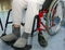 Man with leg problems over the wheelchairs