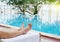 Man legs,senior man  relaxing on lounge chair beside swimming pool