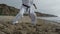 Man legs stepping making karate exercise close up. Man training combat skills.
