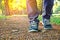 Man legs walking in a park with beautiful nature