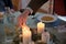 Man lighting the candles on Advent wreath