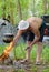 Man lighting a cooking fire while camping