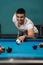 Man Lining Ball Up To Break In Pool