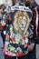 Man with lion and floral design on back and guest with sequin jacket before Versace fashion show, Milan Fashion