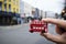 Man with a londoner red double-decker bus