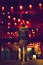 Man looking at bright lights red Lanterns in the alley in downtown los angeles