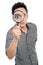 Man looking through a magnifying glass