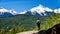 Man looking at the Tantalus Mountain Range