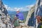 Man looking towards the via ferrata ladder at Intersport Klettersteig, near Gosau, Austria