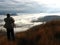 A man looks out over the cloud-covered Ithala Game Reserve