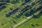 Man-made landscape. Furrowed fields. Structure of stripes and rows.