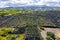 Man-made landscape of the Pico Island Vineyard Culture, Azores, Portugal. Pattern of spaced-out, long linear walls running inland