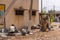 Man makes big stone mortars in street of Lakundi, Karnataka, India