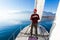 Man makes a coffee break on sailboat