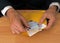 Man makes payment in Euros - with envelope