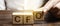 A man makes the word acronym abbreviation CFO. Chief Financial Officer. Financial management in business and company. Risk