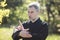 A man martial artist and qigong master practicing tai Chi Taiji Chuan in a Park