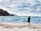 a man at Matarangi beach sunset. Coromandel. New Zealand