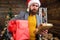 Man mature bearded with eyeglasses received post for santa. Gifts delivery service. Letter for santa claus. Post for
