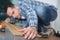 Man measuring laminate board