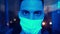Man in medical mask illuminated ambulance flashing lights. Coronavirus concept