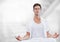 Man Meditating against white background